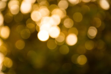 Işık bokeh mutlu yeni yıl arka plan için altın bulanıklık