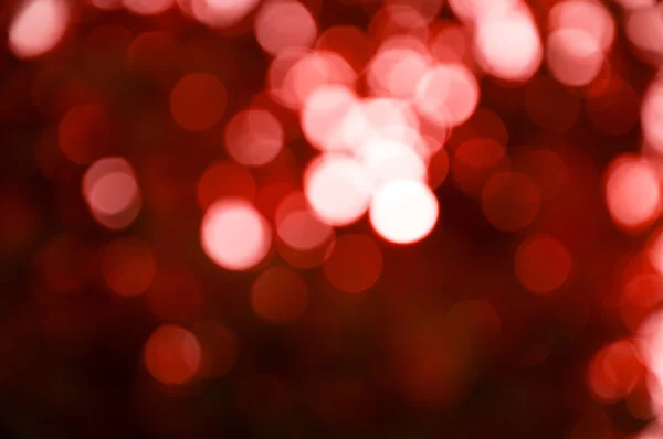 Blur luz bokeh rojo para feliz año nuevo fondo —  Fotos de Stock