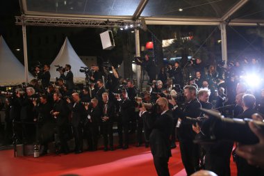 Photographers attend the 'Slack Bay ' 