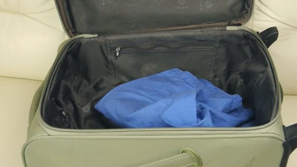 Suitcase with clothing — Stock Video