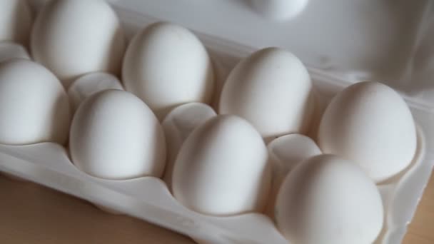 Nice big rural fresh eggs in cardboard egg box holder — Stock Video