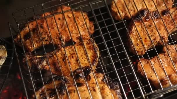 Meat on the grill with flames closeup — Stock Video