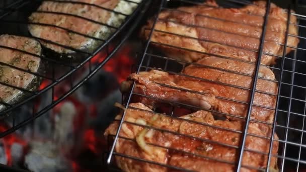 Meat on the grill with flames closeup — Stock Video