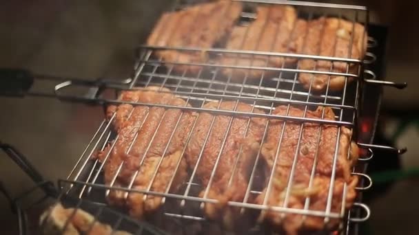 Meat on the grill with flames closeup — Stock Video