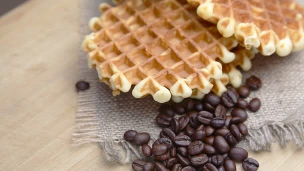 Closeup of waffles on coffee beans — Stock Video