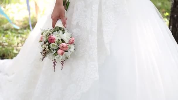 Beautiful wedding flowers in hands — Stock Video