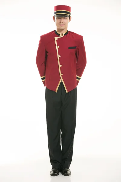 Beyaz bir arka planın önünde Çinli giyim garsonu giymişsin.
