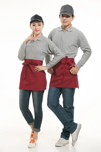 Wear all kinds of T-shirts waiter standing in white background — Stock Photo, Image