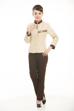 Beyaz bir arka plan önünde Stand tulum giymiş