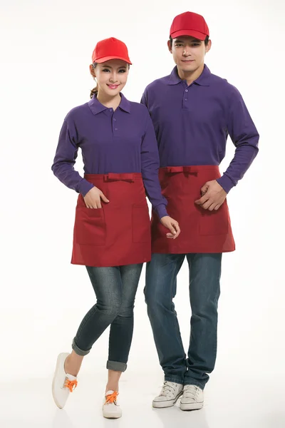 Wear all kinds of T-shirts waiter standing in white background — Stock Photo, Image