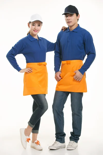 Wear all kinds of T-shirts waiter standing in white background — Stock Photo, Image