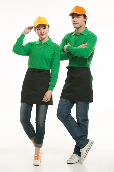 Wear all kinds of T-shirts waiter standing in white background — Stock Photo, Image