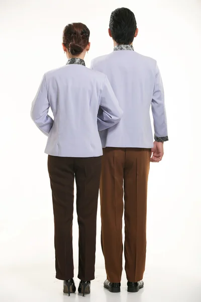 Gekleed in overall die staan voor een witte achtergrond — Stockfoto