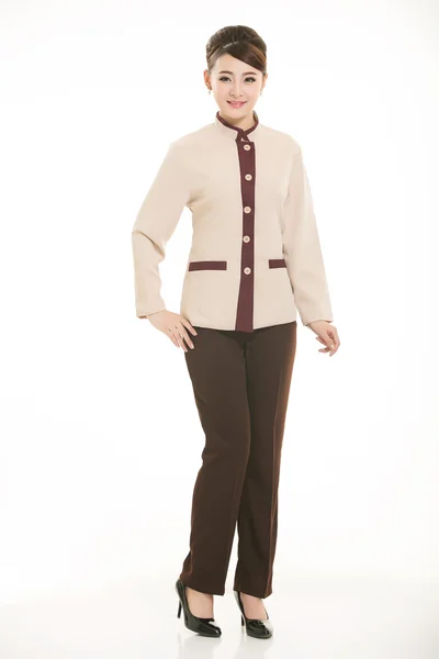 Klädd i overall som står framför en vit bakgrund — Stockfoto