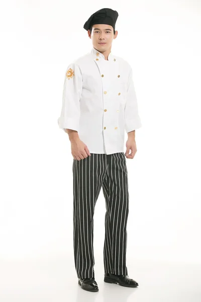 Vestindo todos os tipos de roupas chef nutricionista na frente de fundo branco — Fotografia de Stock