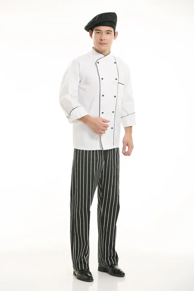 Vestindo todos os tipos de roupas chef nutricionista na frente de fundo branco — Fotografia de Stock