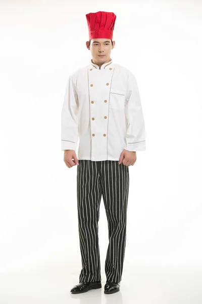 Vestindo todos os tipos de roupas chef nutricionista na frente de fundo branco — Fotografia de Stock