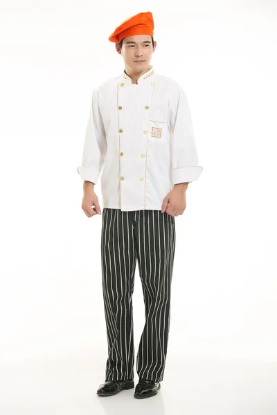 Indossare tutti i tipi di abbigliamento chef dietista di fronte a sfondo bianco — Foto Stock