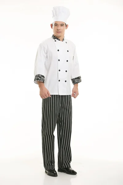 Vestindo todos os tipos de roupas chef nutricionista na frente de fundo branco — Fotografia de Stock