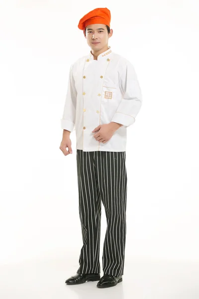 Het dragen van allerlei kleding chef-kok diëtist in de voorkant van witte achtergrond — Stockfoto