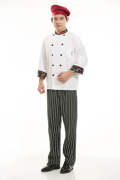 Vestindo todos os tipos de roupas chef nutricionista na frente de fundo branco — Fotografia de Stock