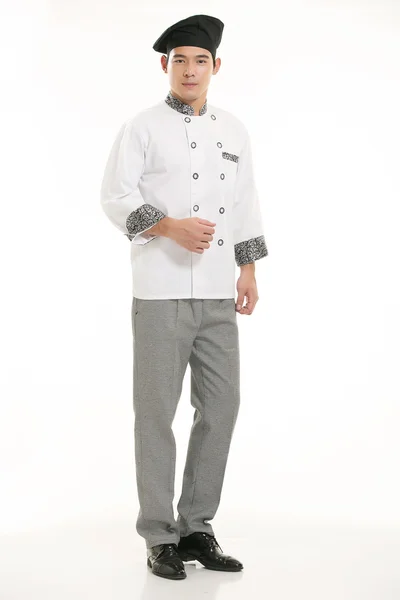 Vestindo todos os tipos de roupas chef nutricionista na frente de fundo branco — Fotografia de Stock