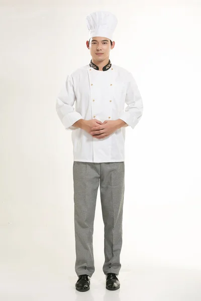 Wearing all kinds of clothing chef dietitian in front of white background — Stock Photo, Image