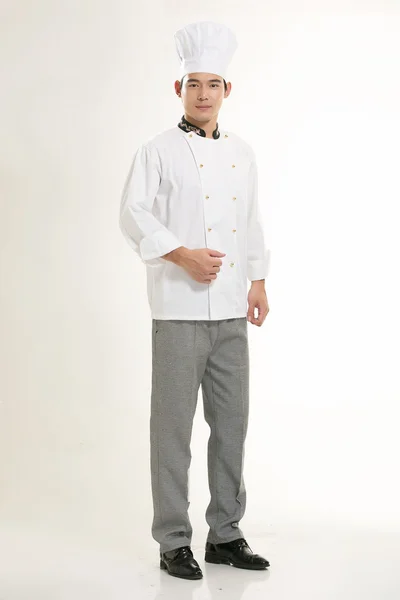 Wearing all kinds of clothing chef dietitian in front of white background — Stock Photo, Image