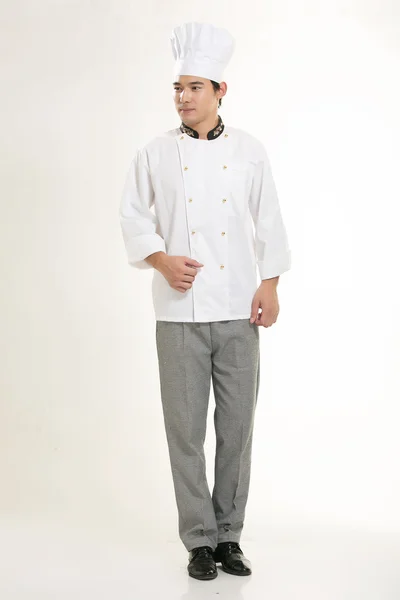 Wearing all kinds of clothing chef dietitian in front of white background — Stock Photo, Image