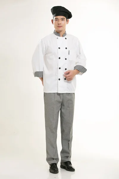 Usando todo tipo de ropa de chef dietista en frente de fondo blanco —  Fotos de Stock