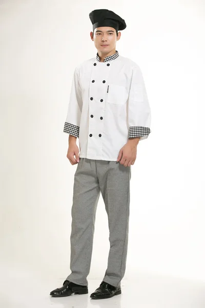 Beyaz arka planda her türlü giyim aşçısının diyetini giyerek. — Stok fotoğraf