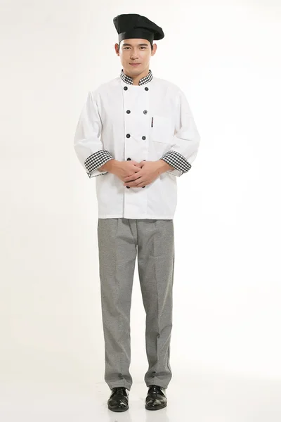 Wearing all kinds of clothing chef dietitian in front of white background — Stock Photo, Image