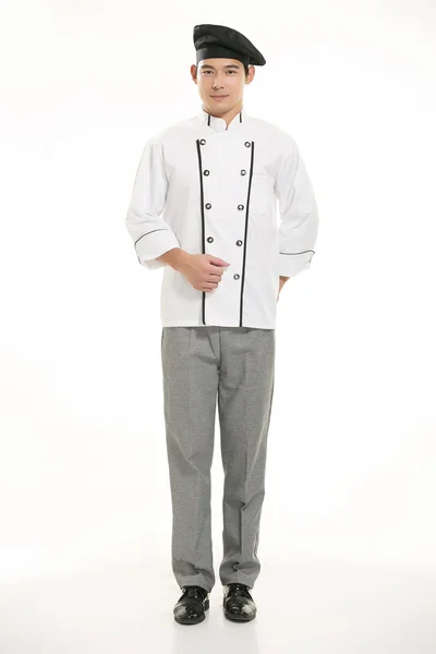 Vestindo todos os tipos de roupas chef nutricionista na frente de fundo branco — Fotografia de Stock