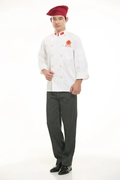 Vestindo todos os tipos de roupas chef nutricionista na frente de fundo branco — Fotografia de Stock