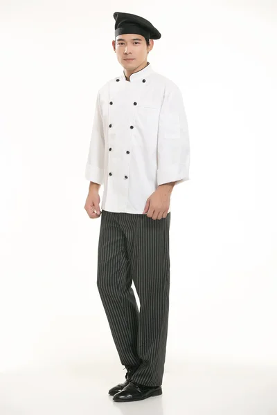 Vestindo todos os tipos de roupas chef nutricionista na frente de fundo branco — Fotografia de Stock