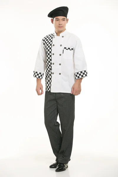 Vestindo todos os tipos de roupas chef nutricionista na frente de fundo branco — Fotografia de Stock