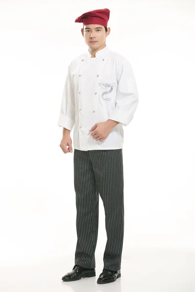 Vestindo todos os tipos de roupas chef nutricionista na frente de fundo branco — Fotografia de Stock