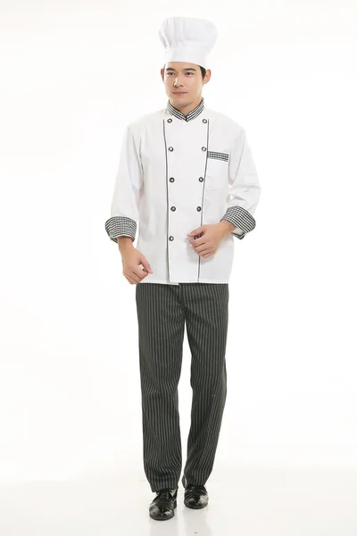 Indossare tutti i tipi di abbigliamento chef dietista di fronte a sfondo bianco Immagini Stock Royalty Free