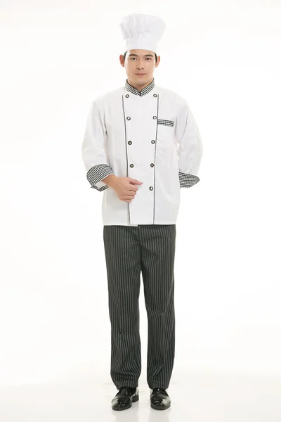 Vestindo todos os tipos de roupas chef nutricionista na frente de fundo branco Imagem De Stock