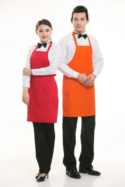 Wear all sorts of apron waiter standing in white background — Stock Photo, Image