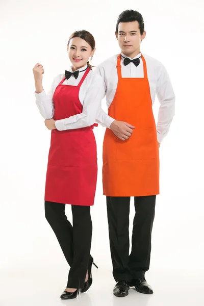 Wear all sorts of apron waiter standing in white background — Stock Photo, Image