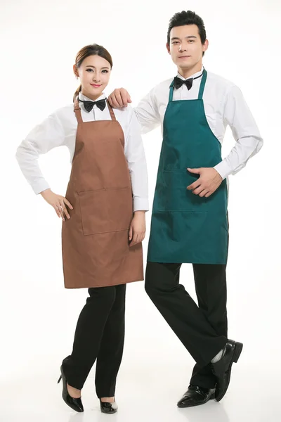 Wear all sorts of apron waiter standing in white background — Stock Photo, Image