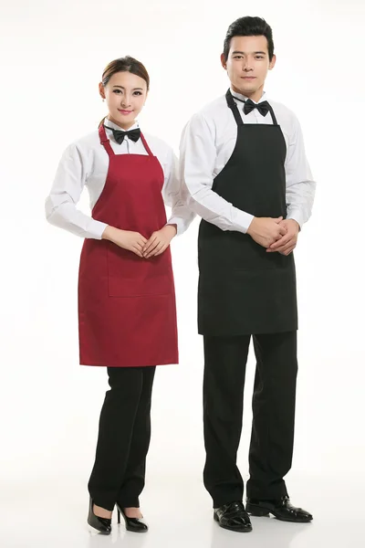 Wear all sorts of apron waiter standing in white background — Stock Photo, Image