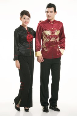 Wearing Chinese clothing waiter in front of a white background clipart