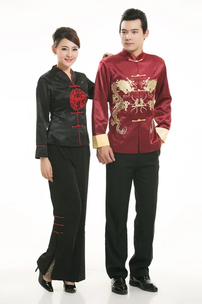 Nošení čínské oblečení číšník před bílým pozadím — Stock fotografie