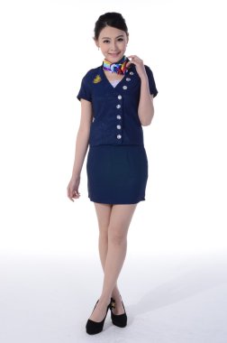 Etkin kız beyaz arka plan önünde profesyonel kıyafetleri giymek