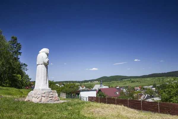 Monk statue at the foot of the castle in Checiny, Poland — Stock Photo, Image