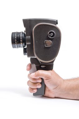 Beyaz izole bir vintage film kamera tutan el
