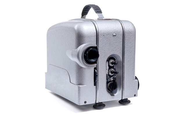 Retro old reel movie projector for cinema. With clipping path. Analogue movie projector with reels isolate on white background.
