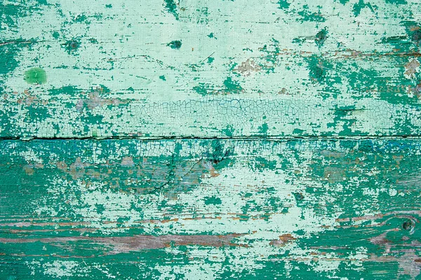 Old woodan wall, shabby paint as background — Stock Photo, Image